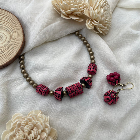 Yellow Indus tribal beaded terracotta pendant set with jhumkas