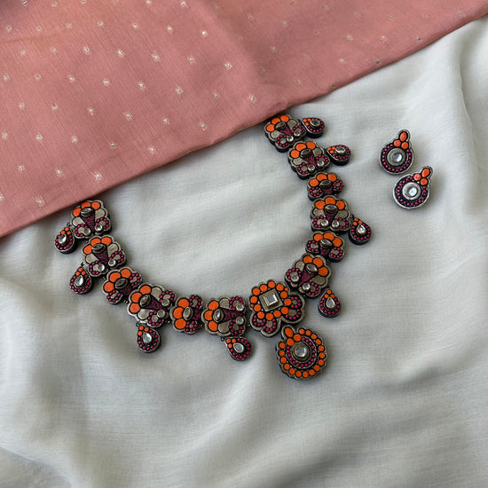 Handmade terracotta necklace with orange and pink stones for party wear