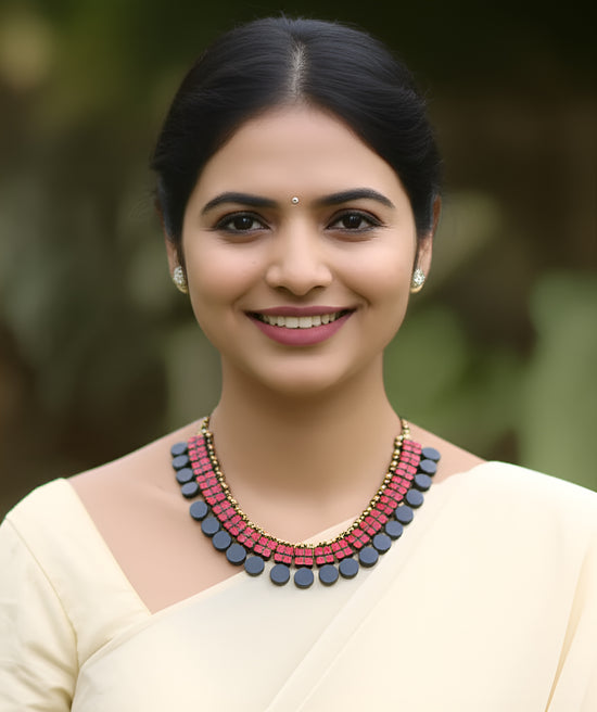 Red and black terracotta collar necklace with disc danglers and jhumka earrings