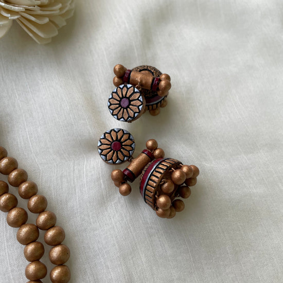 Layered floral clay jhumka earrings