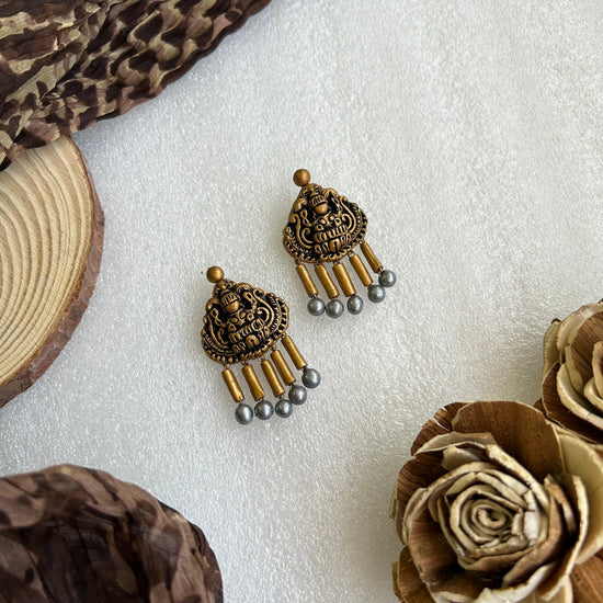 Terracotta lakshmi earrings - Danglers in gold and silver shades