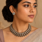 Handmade terracotta necklace set with white Kundan stone embellishments and antique-finish bead detailing.
