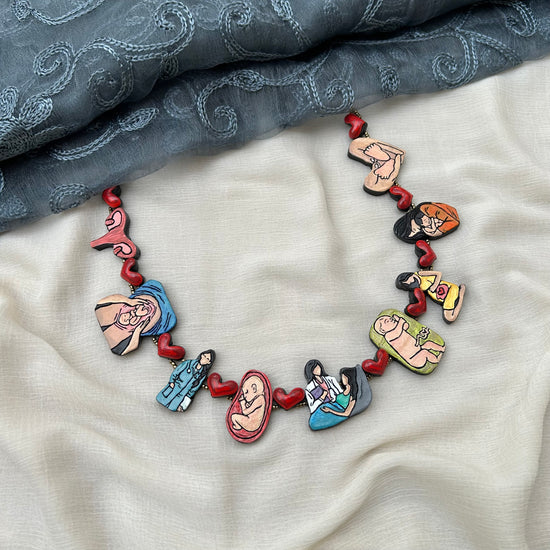 Pregnancy journey hand-painted clay necklace set with swaddled baby drop earrings