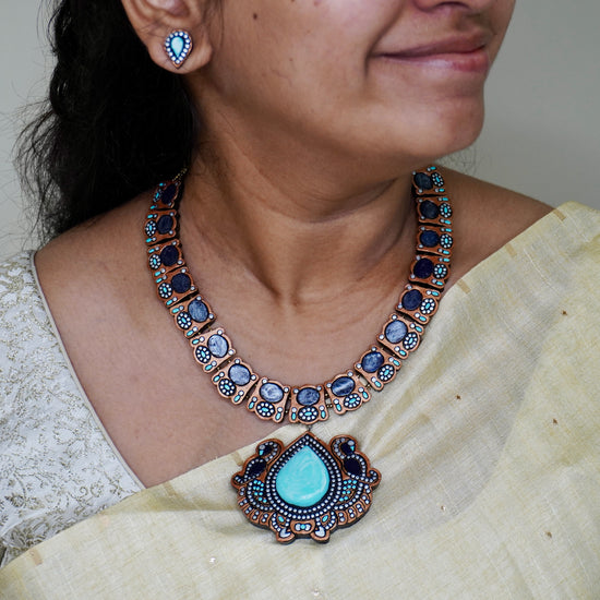 Teal terracotta peacock necklace set with fish motif tiles