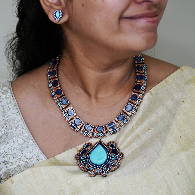Teal terracotta peacock necklace set with fish motif tiles