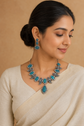 Bird terracotta necklace set in teal