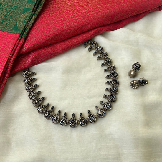 Antique Peacock Silver and Black Terracotta Necklace Set with Miniature Jhumkas