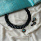 Black terracotta beaded necklace with pendant