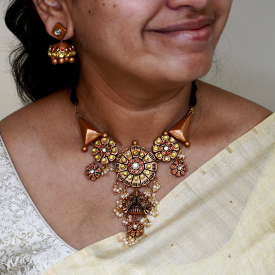 Peacock terracotta choker and jhumkas with Kundhan Stones