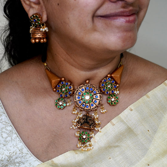 Peacock terracotta choker and jhumkas with Kundhan Stones