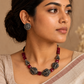 Terracotta Lakshmi Motif Necklace Set with Red Glass Stones
