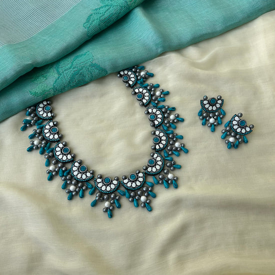 Chand Floral Blue Terracotta Necklace Set with dangling beads