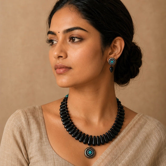 Black terracotta beaded necklace with pendant