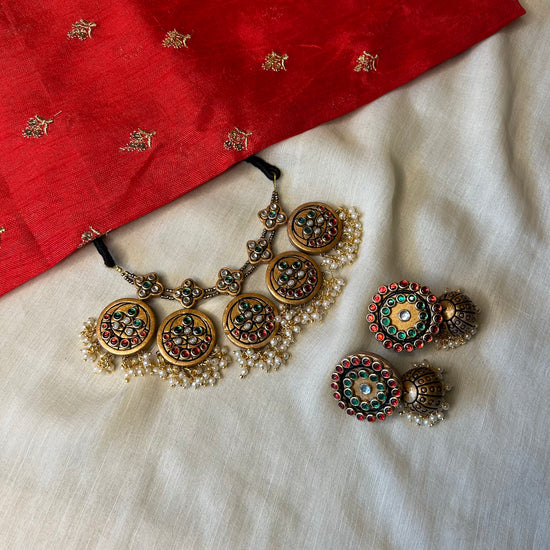 Kundan stone terracotta circles choker with jhumka