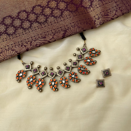 Paisley choker set with orange kundan stone