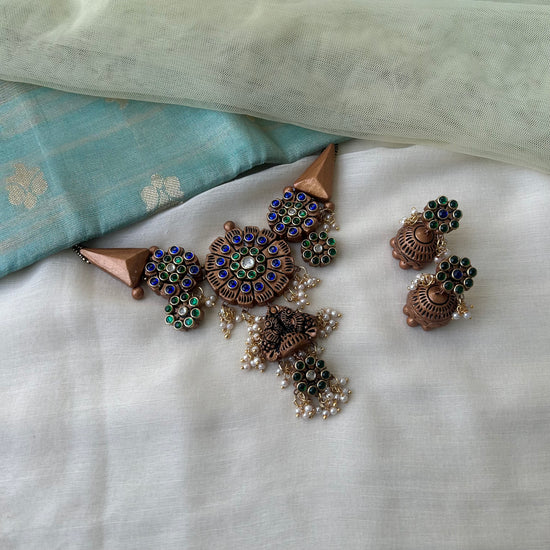 Peacock terracotta choker and jhumka with blue and emerald green kundan stone
