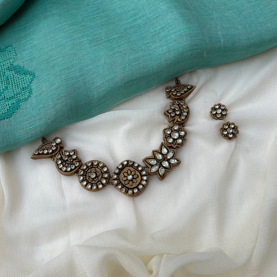 White floral kundan stone clay choker set