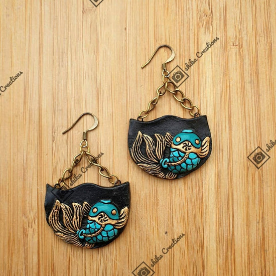 Dangling Teal Fish
