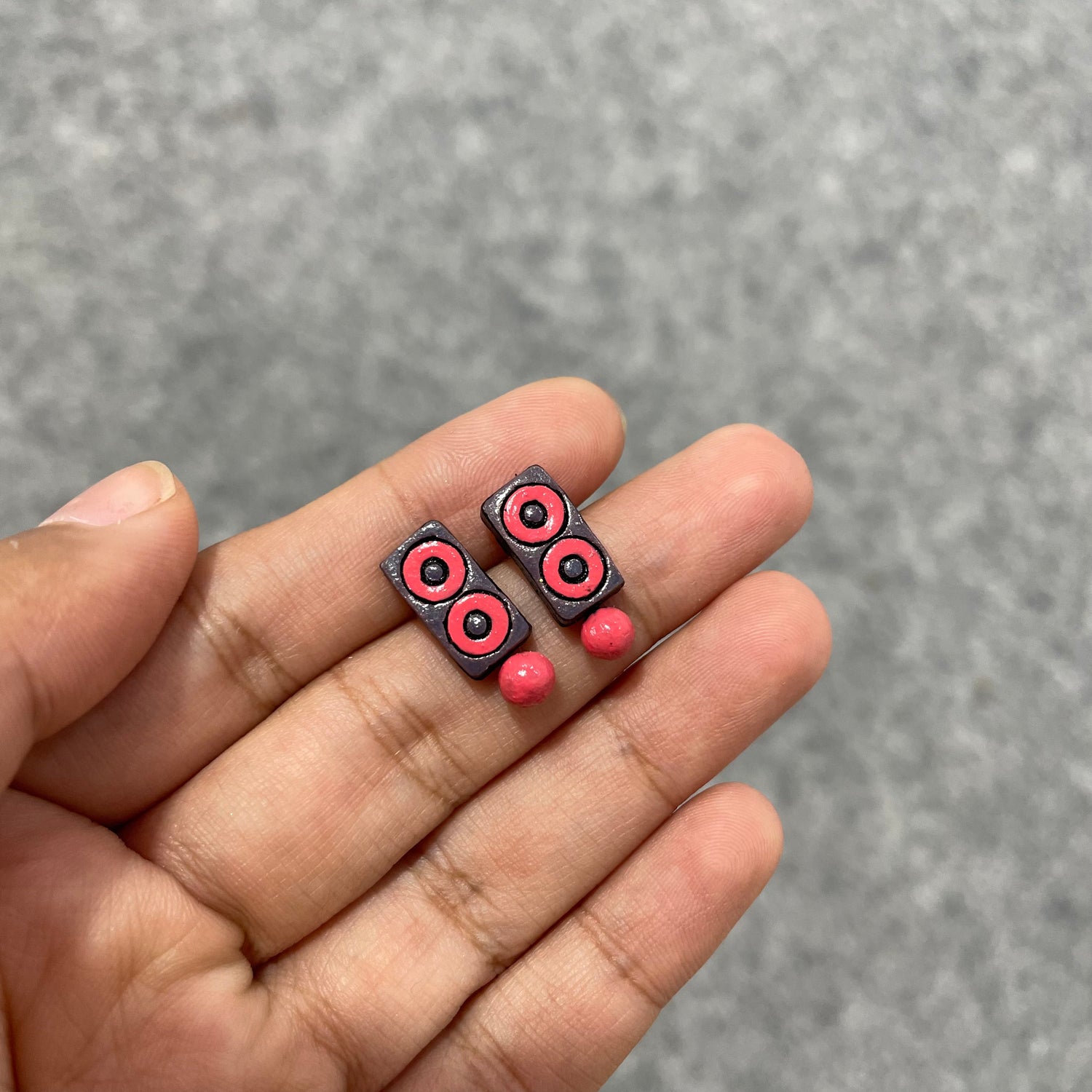 Handmade terracotta pink and gray rectangular stud earrings with clay bead drop.