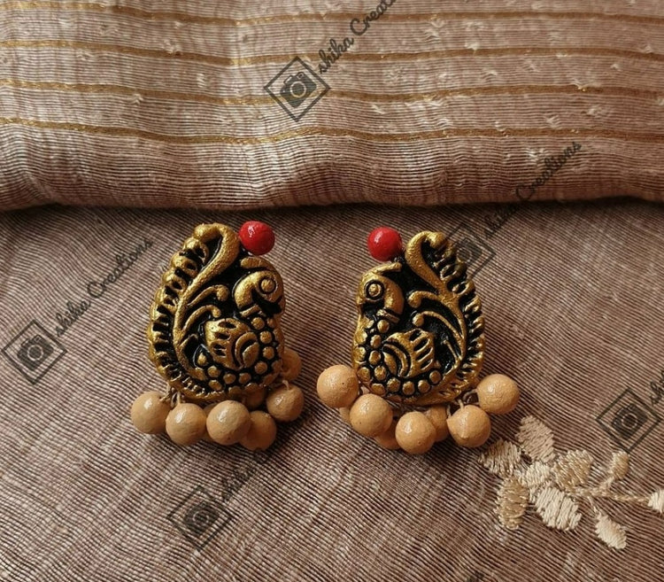Handmade oxidised gold peacock terracotta stud earrings with brown clay beads