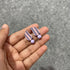 Handmade pink and blue pastel paisley clay stud earrings with clay bead drop.