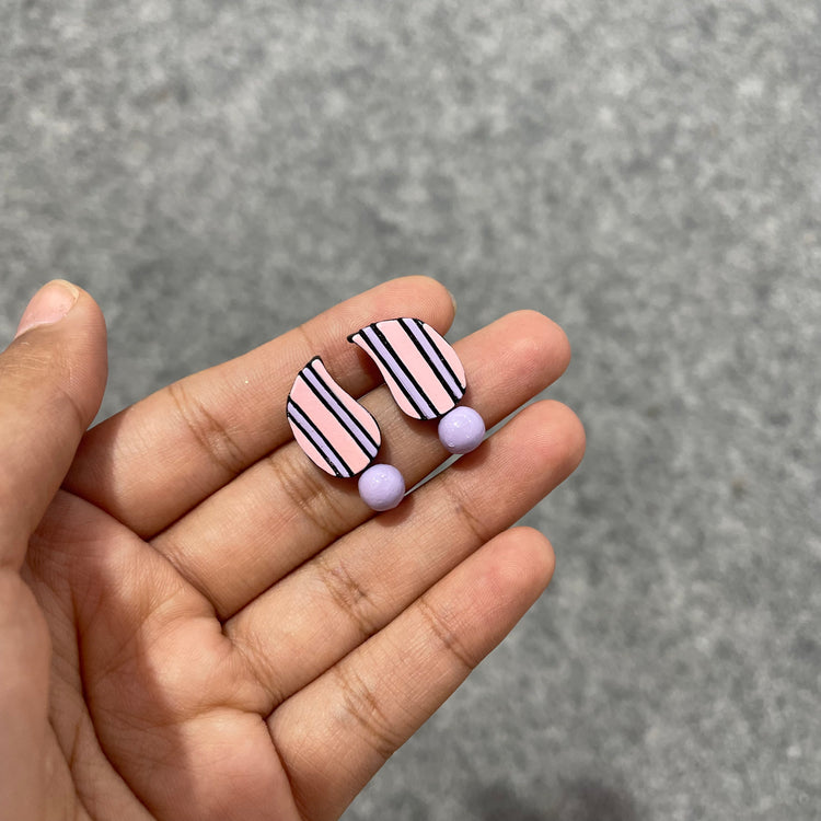 Handmade pink and blue pastel paisley clay stud earrings with clay bead drop.