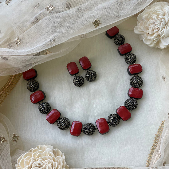 Black monochrome floral textured handmade terracotta beaded necklace