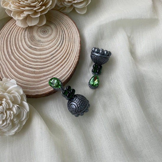 Oxidized silver terracotta jhumka with green stone